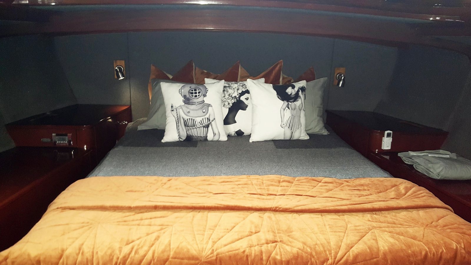 The master cabin, a full-beam bed with cabinetry to both sides